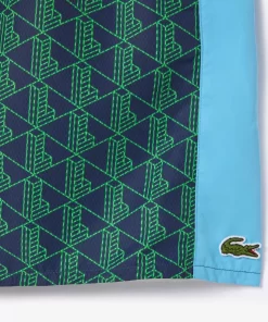 Lacoste Swimwear- Mid Length Monogram Print Swim Trunks