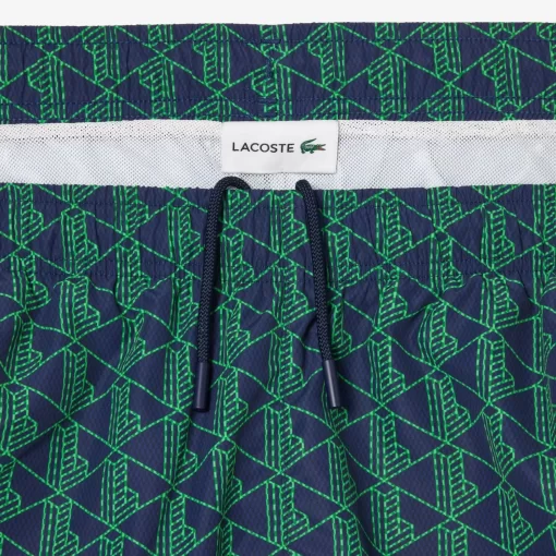 Lacoste Swimwear- Mid Length Monogram Print Swim Trunks