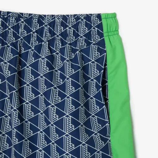 Lacoste Swimwear- Mid Length Monogram Print Swim Trunks