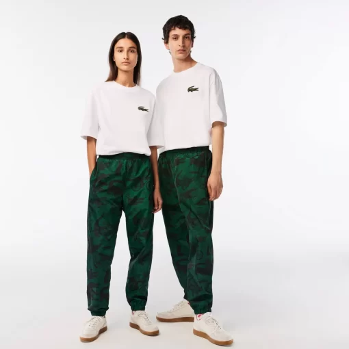 Lacoste Trousers & Shorts-Unisex X Netflix Printed Track Pants